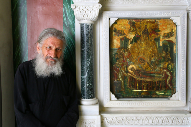 Priest and El Greco painting, Syros Greece